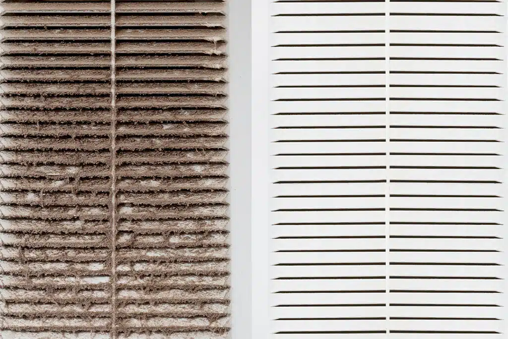 dirty air filter full of dust and debris next to a sparkling clean air filter