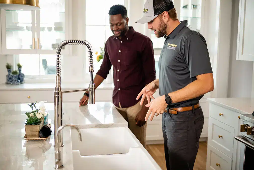 a man standing in a kitchen