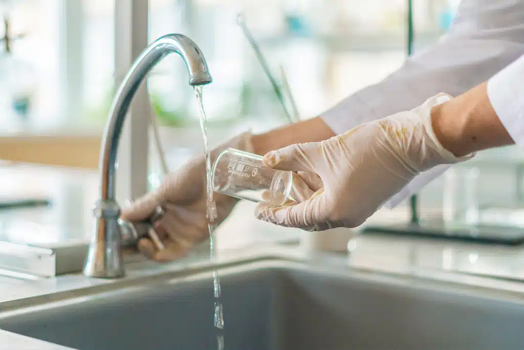 a hand holding an object